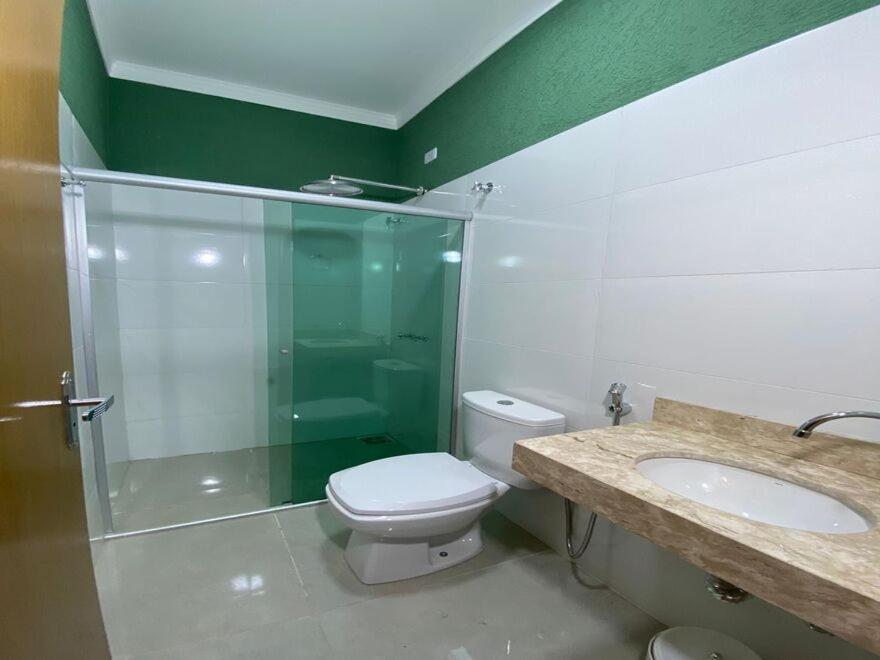 Ванная комната в AMPARO HOTEL