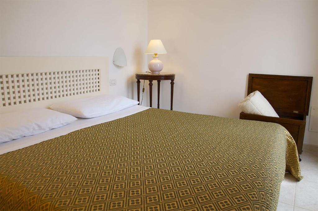 Posteľ alebo postele v izbe v ubytovaní Residence Castello Otranto
