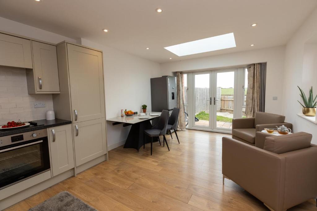 Køkken eller tekøkken på The Poppies Cottage