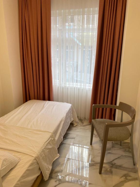 Säng eller sängar i ett rum på yenikap hotel
