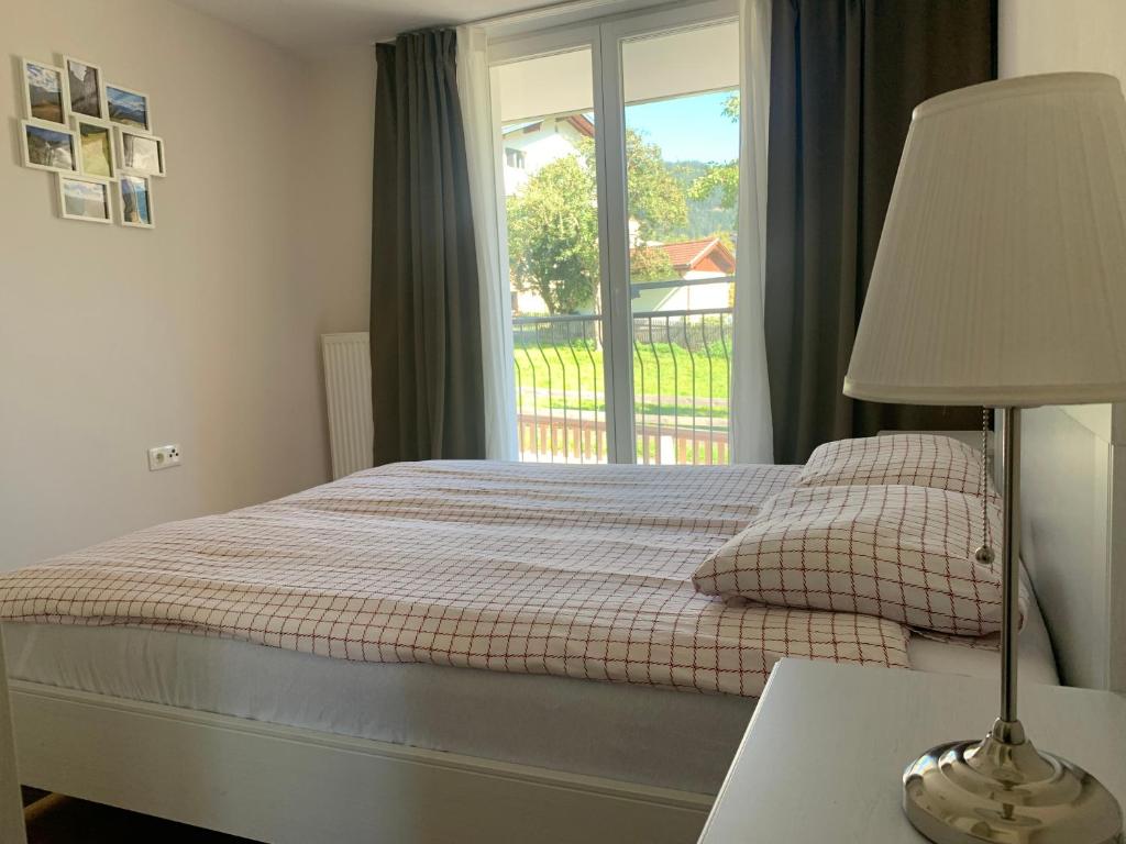 Postel nebo postele na pokoji v ubytování Fliess Apartment