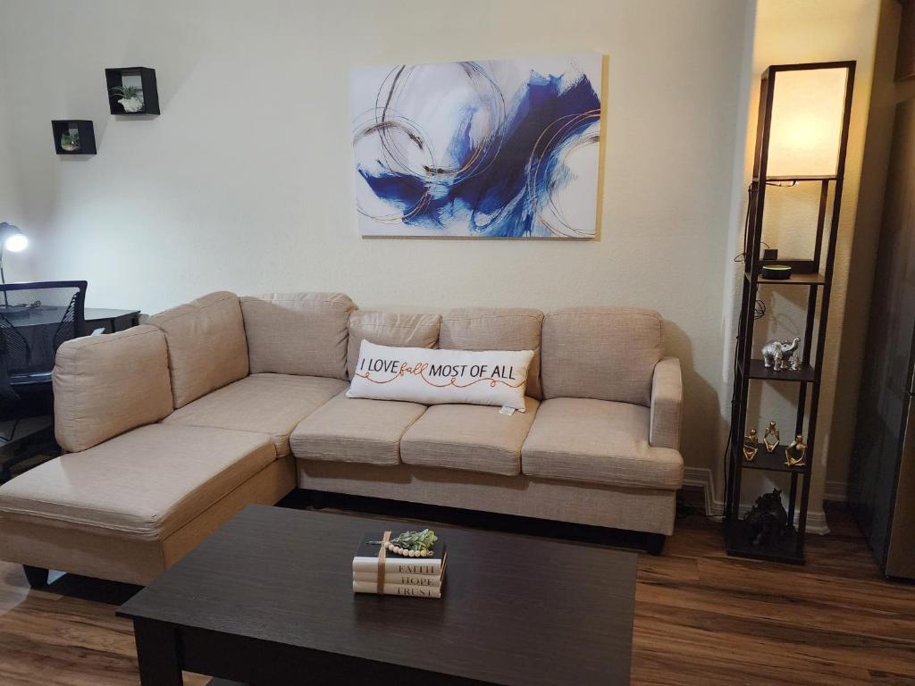 a living room with a couch and a coffee table at Spacious and comfortable Villa 4BD/2BA (10 sleeps) in Galveston