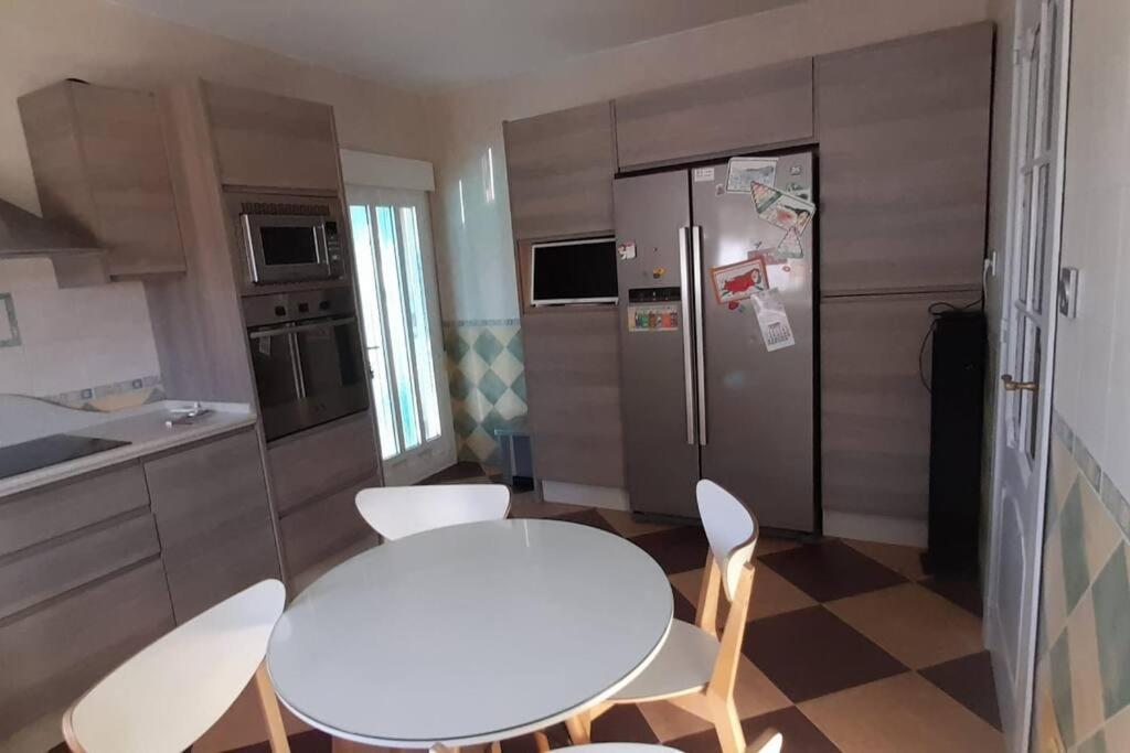 Kuchyň nebo kuchyňský kout v ubytování Villa La Hojilla relax o trabajo