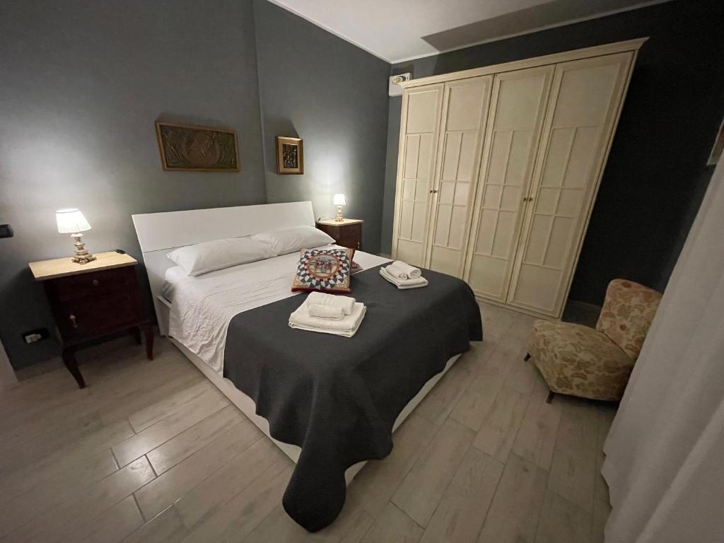 Postel nebo postele na pokoji v ubytování Casa Nettuno