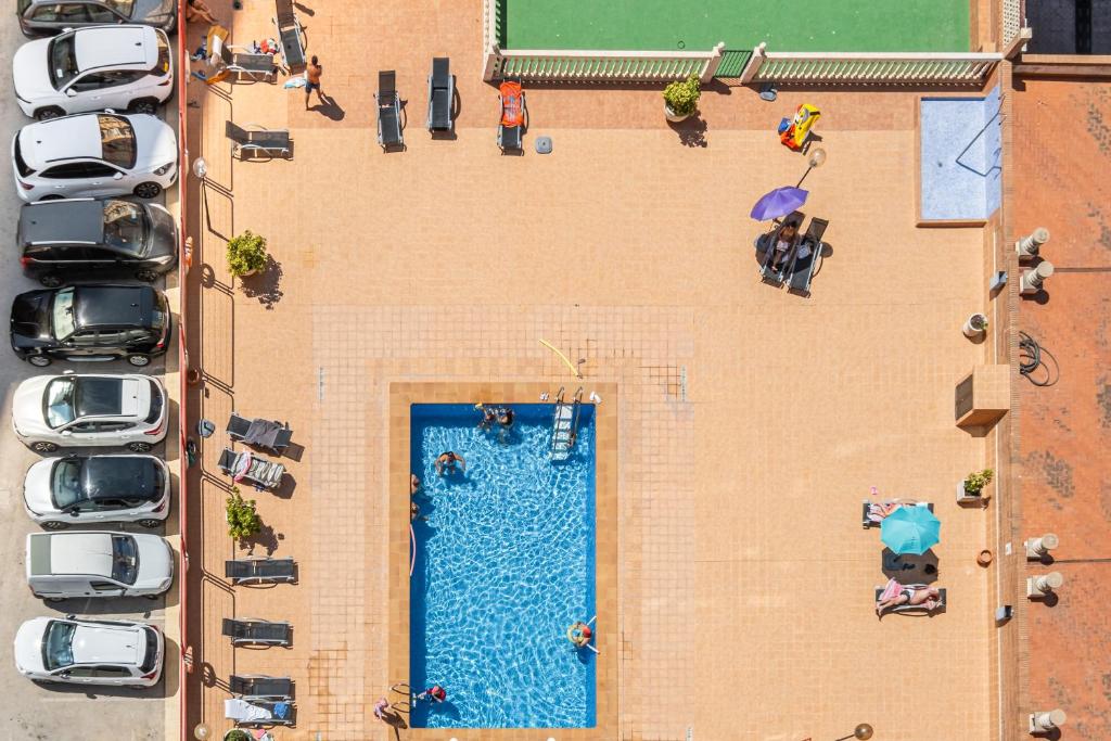 Bazén v ubytovaní Loix Mar 11-E Apartment Levante Beach alebo v jeho blízkosti
