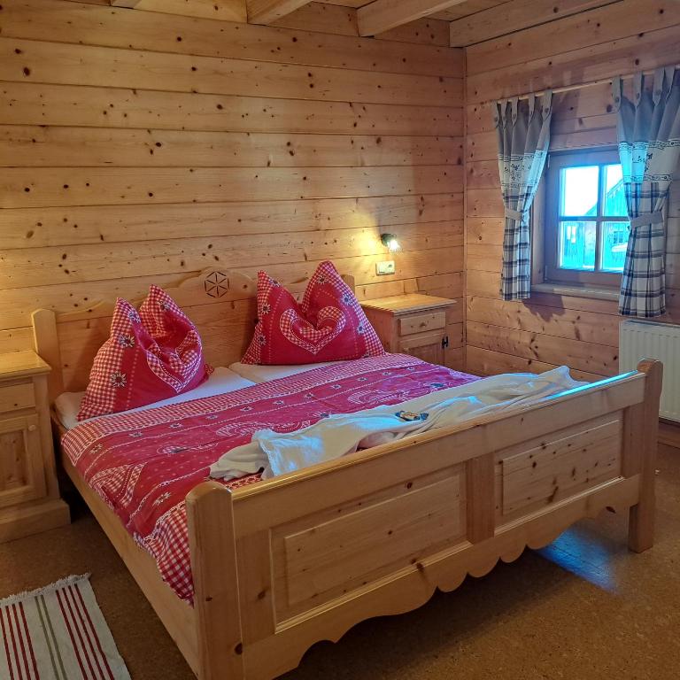 Postel nebo postele na pokoji v ubytování Ferienwohnung Familie Sigl - Rotlechner