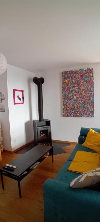 Posezení v ubytování Appartement CHENILLE charmant 2 pièces plein pied avec jardin et vue magnifique