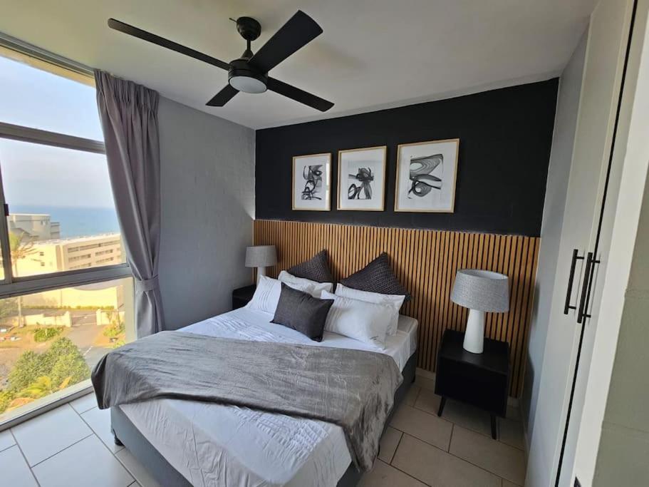 Ένα ή περισσότερα κρεβάτια σε δωμάτιο στο 806 La Ballito