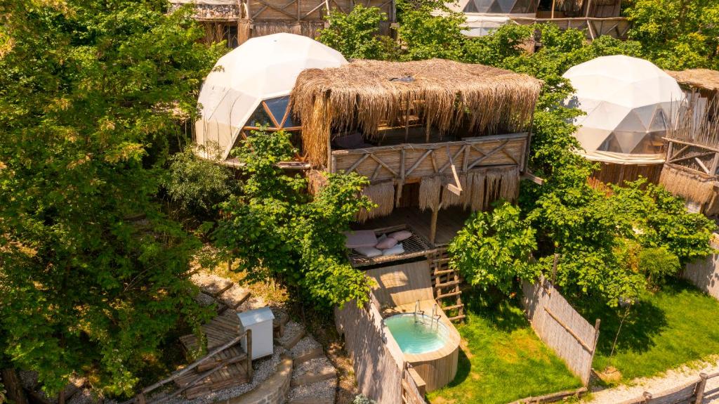 an overhead view of a building with a tree at Sapanca Dome Glamping in Sapanca