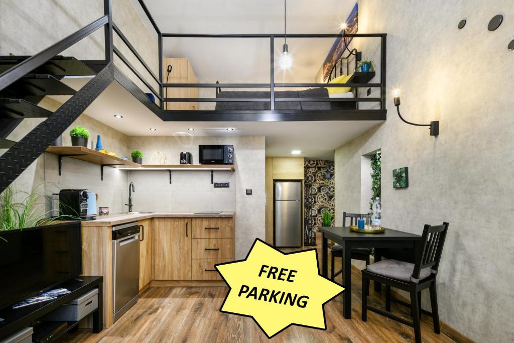 a kitchen with a free parking sign in front of it at Luxury apartment in the city center with parking in Budapest