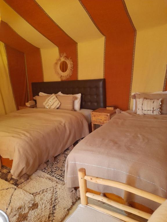 Postel nebo postele na pokoji v ubytování Sahara Stories Camp " Heated Tents"