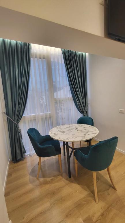 Posezení v ubytování Karanxha's room