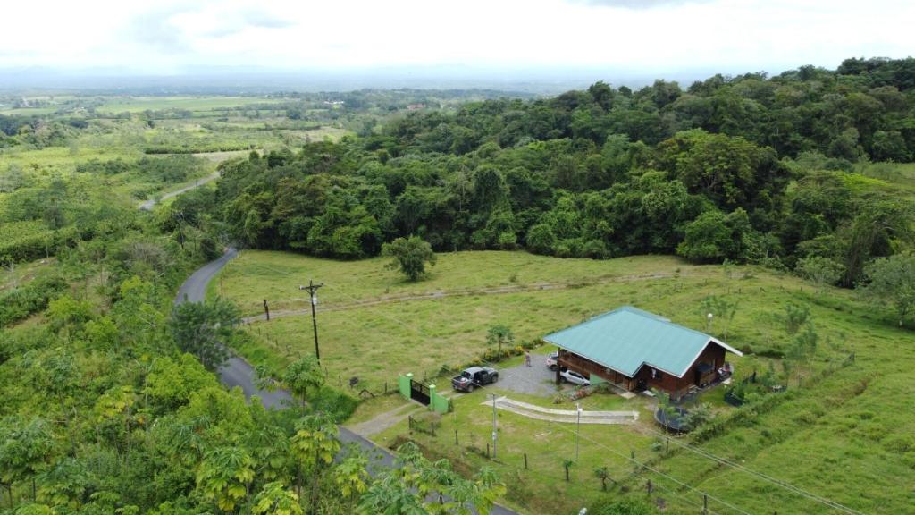 an overhead view of a barn in a field with a road at Cabaña de la Montaña in Río Cuarto