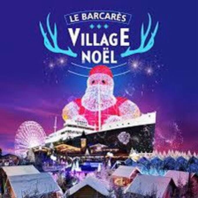 un panneau indiquant le noel du village de villelez de la baraque dans l'établissement Appartement avec vue magnifique sur le lac marin, au Barcarès