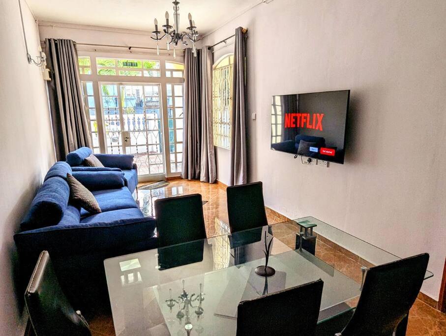 TV a/nebo společenská místnost v ubytování Villa Coco - Flic en Flac