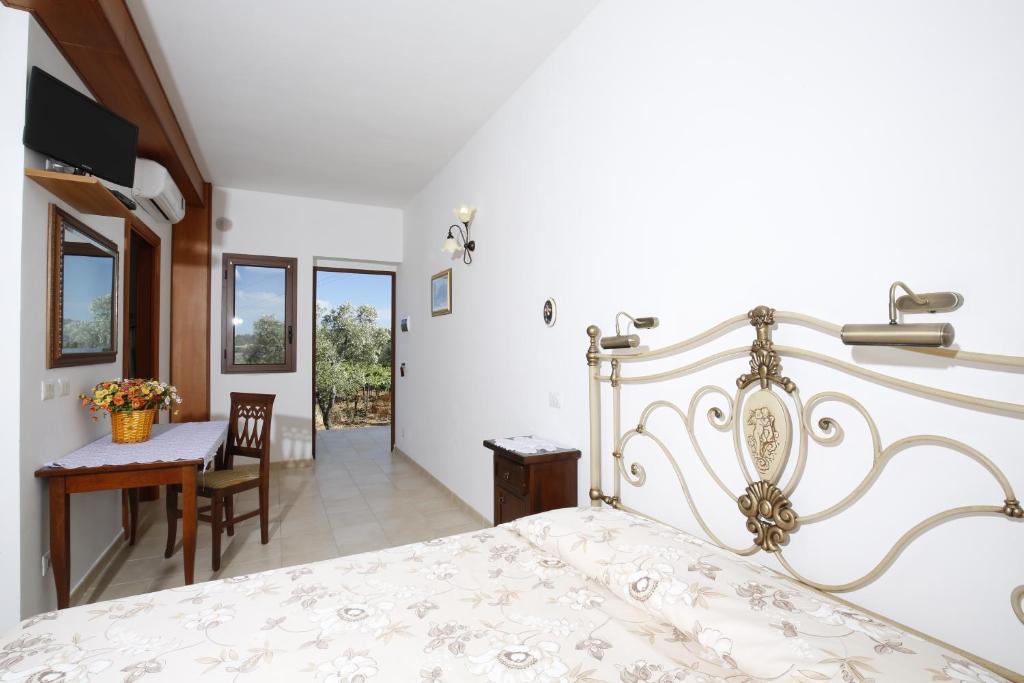 Łóżko lub łóżka w pokoju w obiekcie Agriturismo Posta Pastorella
