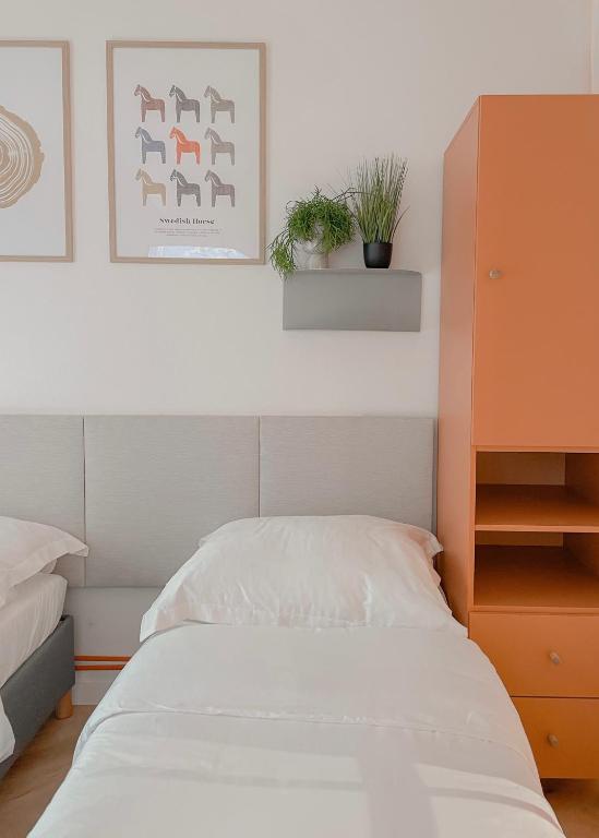 Postel nebo postele na pokoji v ubytování NØDA - Nørdic Design Apartment with Terrace