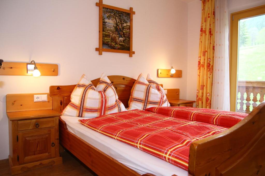 Postel nebo postele na pokoji v ubytování Haus Harmonika
