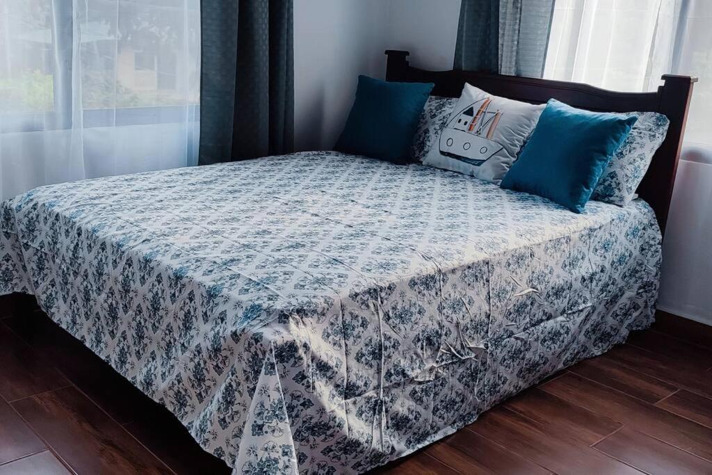 Een bed of bedden in een kamer bij Villa Marina, Nosara