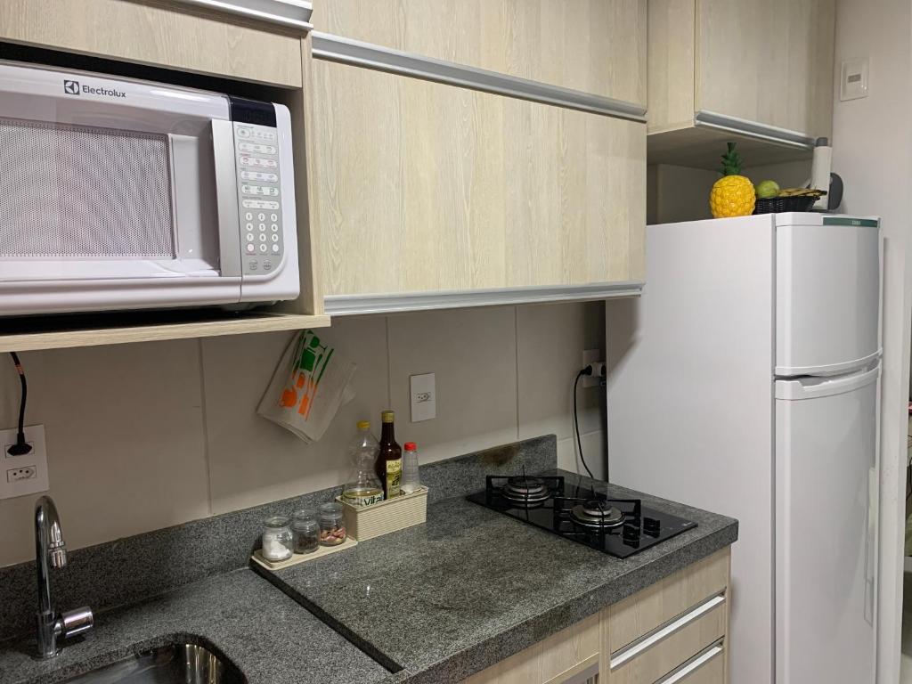 Kuchyň nebo kuchyňský kout v ubytování FLAT ECO RESORT PRAIA DOS CARNEIROS