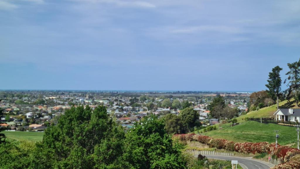 a view of the city from the top of a hill at Room With A view in Napier