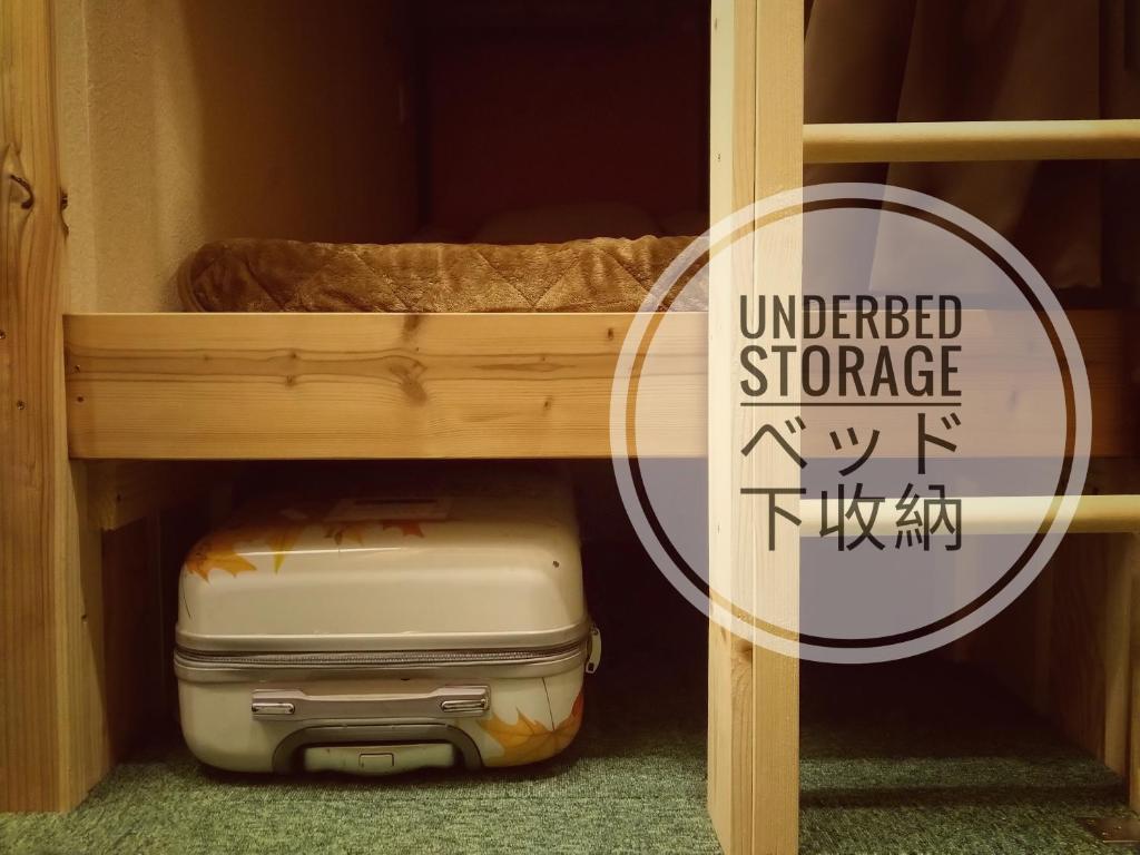 Palanda nebo palandy na pokoji v ubytování Hostel Furoya