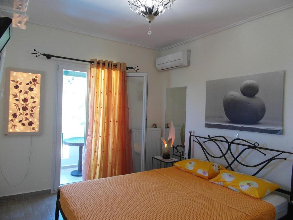 Posteľ alebo postele v izbe v ubytovaní Ionian Villas