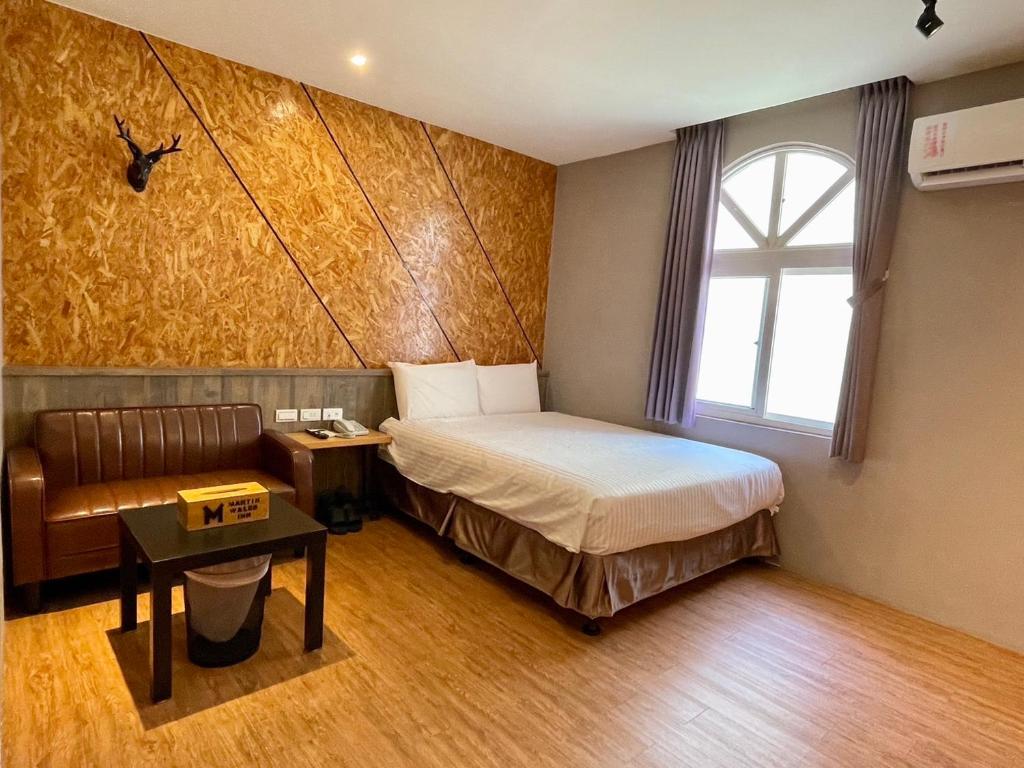 Postel nebo postele na pokoji v ubytování Martin Wales Inn