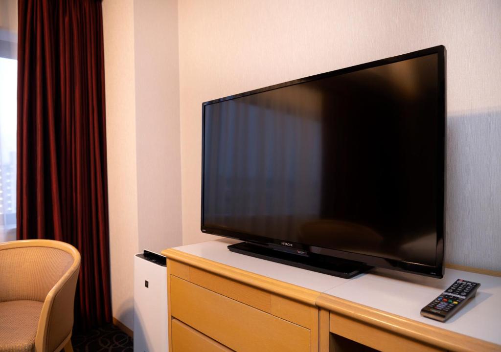 TV a/nebo společenská místnost v ubytování Meitetsu Komaki Hotel