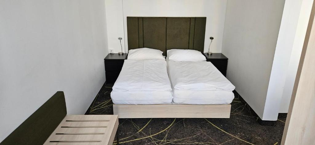 Postel nebo postele na pokoji v ubytování Hotel Valcha