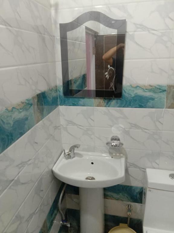 Koupelna v ubytování Sai Saraswati Homestay