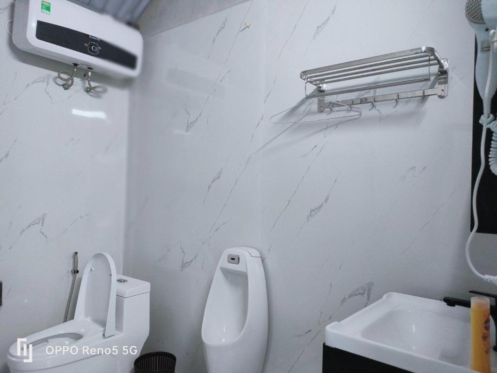 Koupelna v ubytování O Châu Homestay Lào Cai