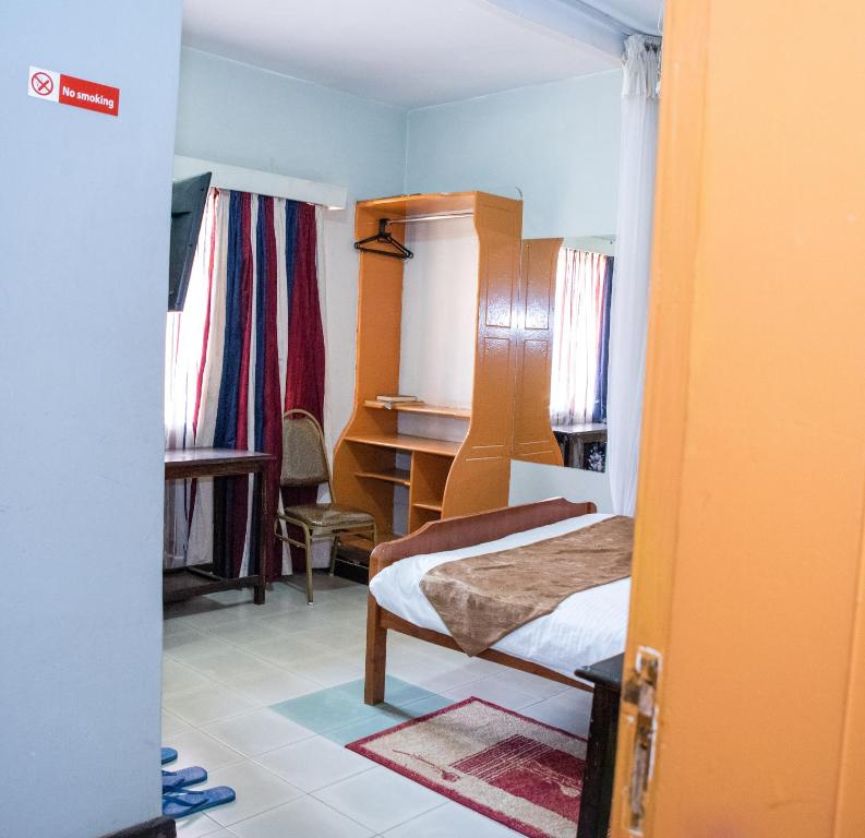 Postel nebo postele na pokoji v ubytování Jupiter Guest House - Parklands