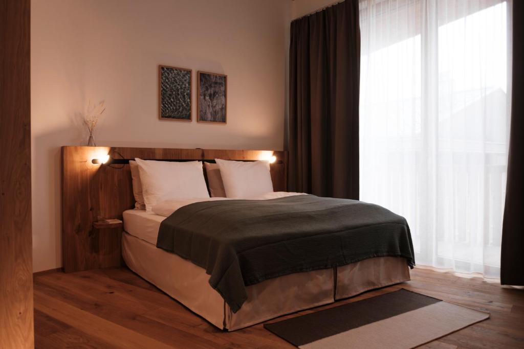 Postel nebo postele na pokoji v ubytování Casa Flurina