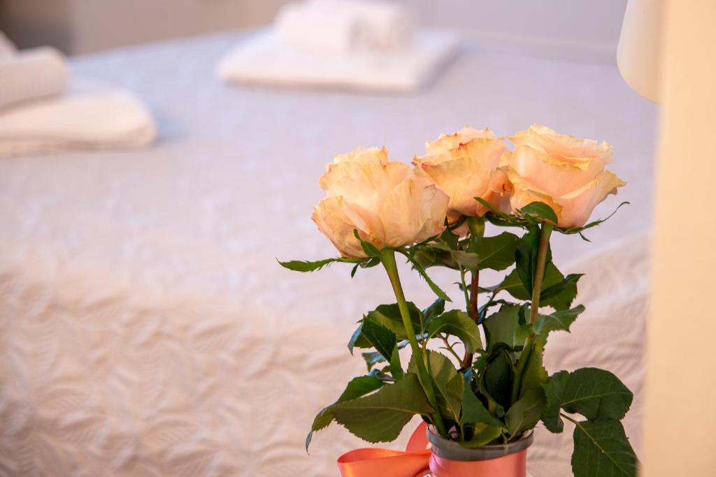 A bed or beds in a room at Il giardino di Luy Apartment