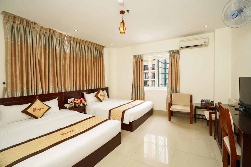 Letto o letti in una camera di Sunview Beach Hotel Danang