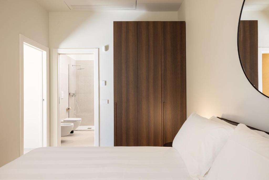 Postel nebo postele na pokoji v ubytování B21 Lifestyle Hotel