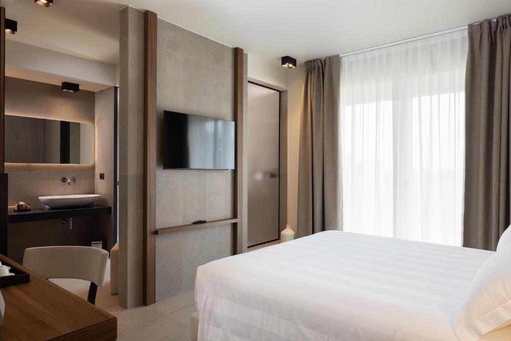 TV a/nebo společenská místnost v ubytování B21 Lifestyle Hotel