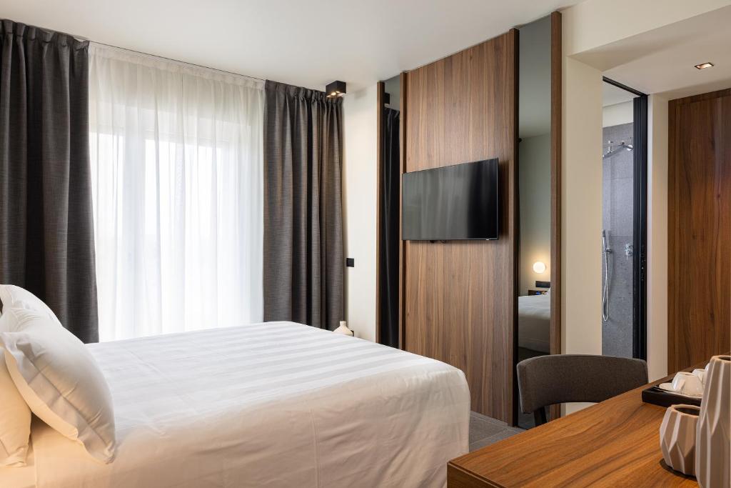 Postel nebo postele na pokoji v ubytování B21 Lifestyle Hotel