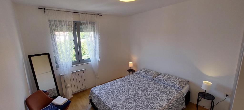 Posteľ alebo postele v izbe v ubytovaní Deluxe Apartment Kristian whit a private parking