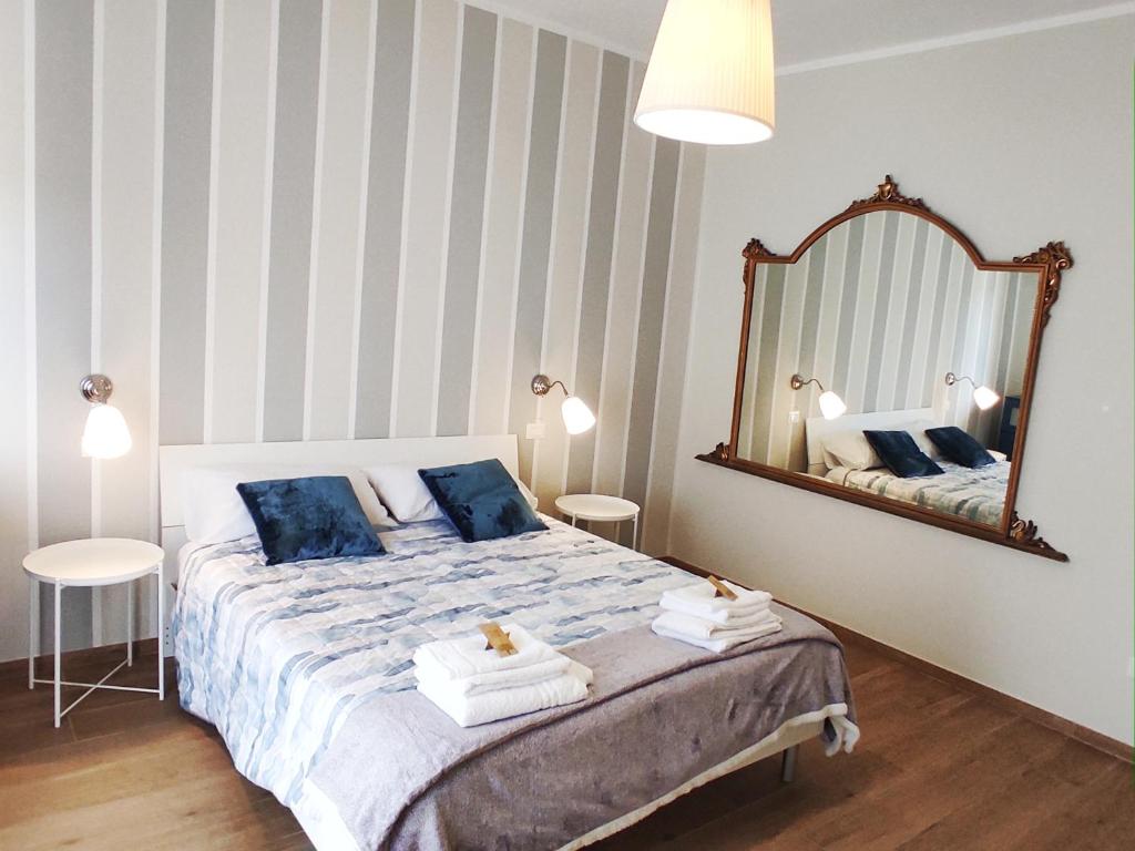 Una cama o camas en una habitación de Alloggio turistico da Elide