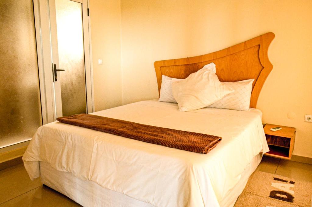 Postel nebo postele na pokoji v ubytování Ponta View Hotel