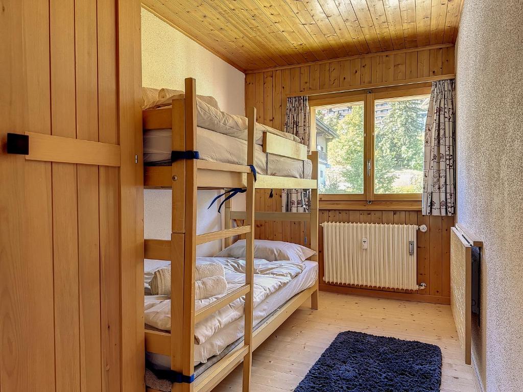 Postel nebo postele na pokoji v ubytování Le Marguerite I Attique I 4 pers