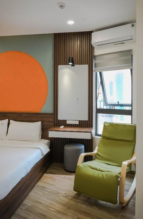 Postel nebo postele na pokoji v ubytování Anstay Beach Da Nang