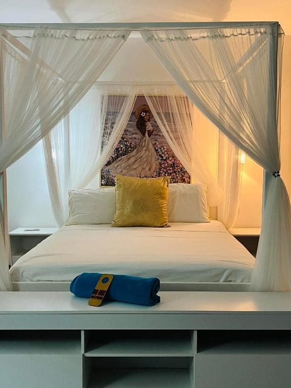 Postel nebo postele na pokoji v ubytování Fogo Boutique Hotel