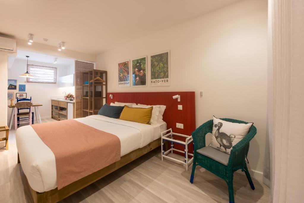 Кровать или кровати в номере Dodo Square Residence