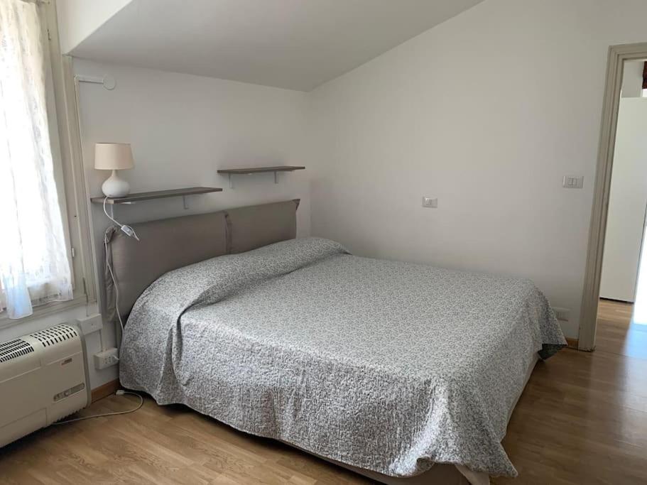 Postel nebo postele na pokoji v ubytování Casa Rino: Vacanze in casetta......
