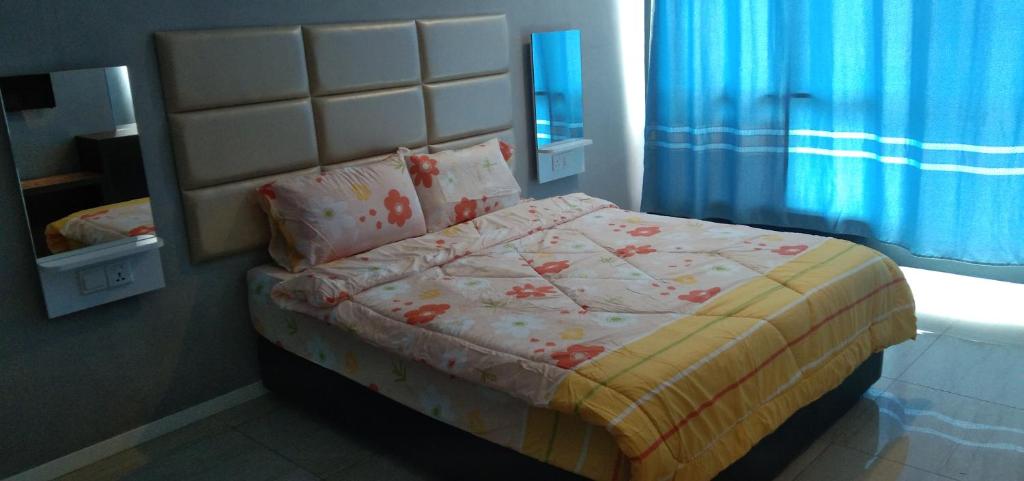 Postel nebo postele na pokoji v ubytování Pintarman Service Apartment