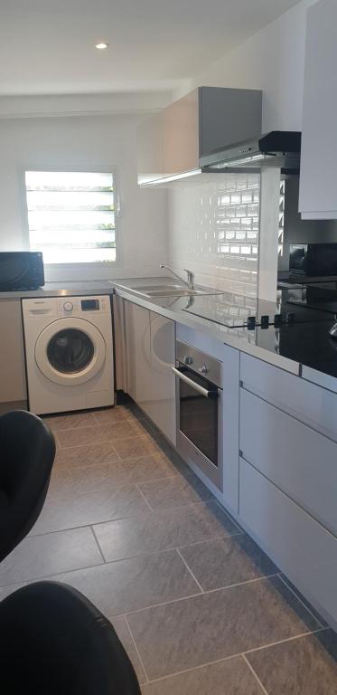 Kuchyň nebo kuchyňský kout v ubytování Au Panorama F3 2 chbres