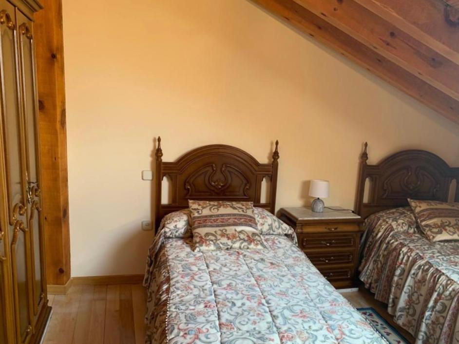 Postel nebo postele na pokoji v ubytování Rincón de Ayllon